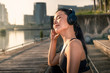 Woman relaxing and listening music with headphones