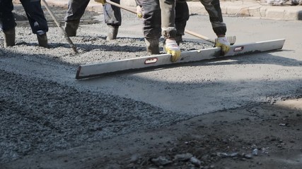 Wall Mural - builders poured concrete at the construction site