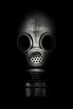 Old Gas Mask On A Black Background