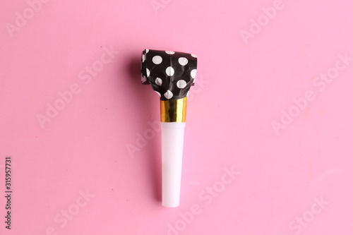 Cuadros en Lienzo party whistle on colorful background