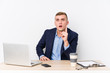 © Asier - Young business man with a laptop having an idea, inspiration concept.