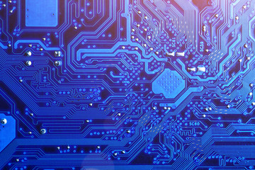 blue circuit board background of computer motherboard,Electronic computer hardware technology.Integrated communication processor. Information engineering component. Blue color.