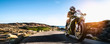 © AA+W - motorbike on the coastal road riding. having fun driving the empty highway on a motorcycle tour journey