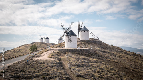 a-traditional-spanish-windmill-in-the-top-of-a-hill-in-the-town-of-consuegra-which-is-located-in-the-province-of-toledo-in-spain-europe