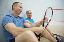 Men Talking On Squash Court