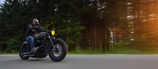 Wall Mural - motorbike on the road riding. having fun riding the empty road on a motorcycle tour / journey