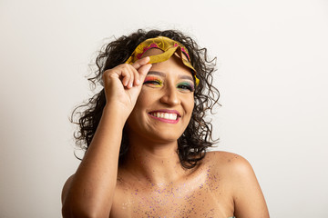 Brazilian Carnival. Young woman in costume enjoying the carnival party.