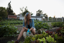 Smiling Woman In Vegetable Garden