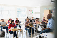 High School Students Listening To Teacher In Classroom