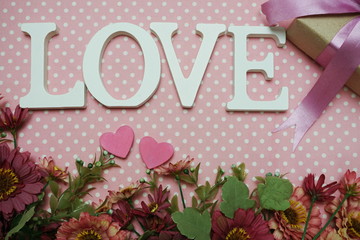 Sticker - Love word alphabet and roses bouquet with space copy on pink polka dot background