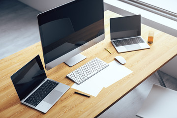 Poster - Top view of desktop with several computers and work accessories. 3D Rendering