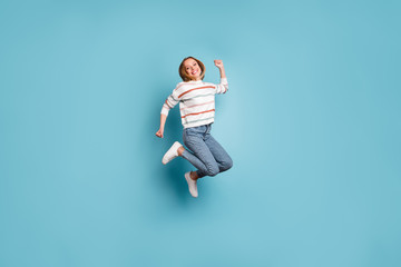 Wall Mural - Full length body size turned photo of cheerful encouraged crazy toothy woman rejoicing in sales started in footwear isolated pastel blue color background