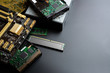© Arnut - group of old and used computer component part on dark background.  recycle and electronic waste concept.