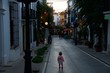 Baby on the street. Little girl on Spanish street. Travel by Spain
