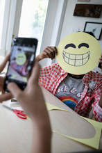 Tween Girl With Camera Phone Photographing Friend Holding Smiling Emoji Art Project