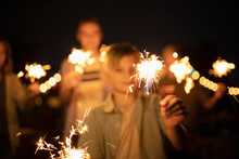 Boys Playing With Sparklers