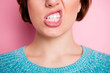 Cropped close-up view portrait of her she aggressive crazy evil mad fury mean woman grinning teeth whitening procedure advert isolated over pink pastel color background