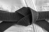 Japanese martial art black belt tied in a knot