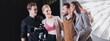 © LIGHTFIELD STUDIOS - panoramic shot of smiling photographer, model, stylist and producer hugging on backstage
