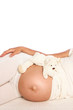 © Kostia - Pregnant woman on a white background