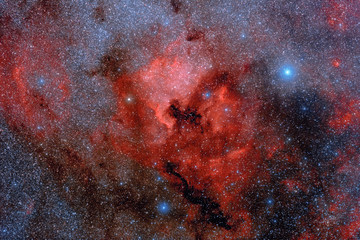 Wall Mural - abstract background with space image. cosmic nebula, stars glow in red in space. long exposure photo