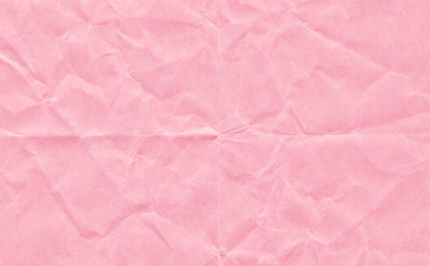 Closeup crumpled light pink paper texture background, texture.Pink paper sheet board with space for text ,pattern or abstract background.