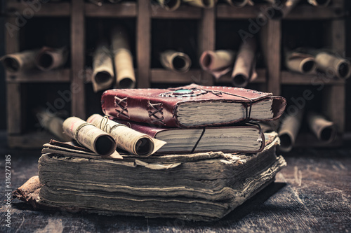 Fotografía Magic scrolls and books in medieval library