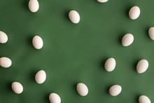 White Eggs Pattern Border Frame On Olive Green Background