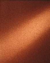 Orange Rough Sandpaper Textured Background With Light Streak