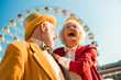 © Yakobchuk Olena - Happy old woman laughing out loud near her husband