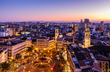 sightseeing of spain. aerial view of valencia at sunset. illuminated plaza de la reina, cityscape of
