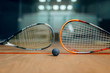 Two squash rackets and ball, game concept