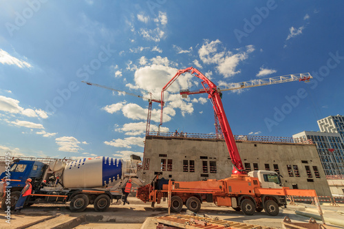 concrete pump building under construction Poster Mural XXL