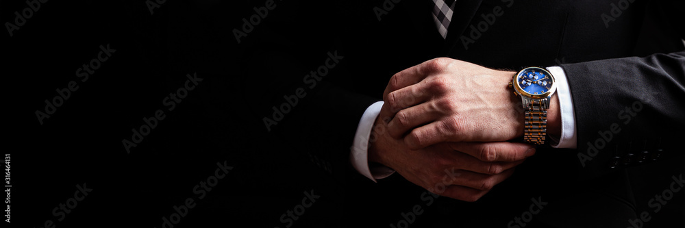 Business Man Checking Time On His Watch - obrazy, fototapety, plakaty 