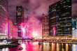 A beautiful timelapse shot of fireworks near the Chicago River at Wolf Point in Chicago, USA