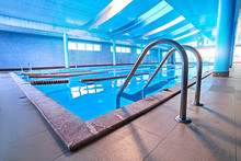 Pool Ladder With Stairs In Empty Pool For Sport Swimming Training In Leisure Center