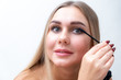 © Евгения Медведева - Beauty Cosmetics. Closeup Of Beautiful Sexy Woman Putting Black Mascara On Long Thick Eyelashes With Brush. Fashionable Female Model With Soft Skin, Perfect Makeup And Fake Eyelashes. High Resolution.