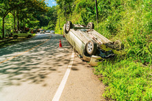 Car Accident Overturned On The Road., Car Wreck By Accident, Insurance Concept, The Car Had An Accident Overturned On The Road.