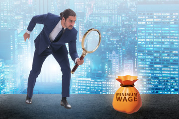 Concept of minimum wage with businessman