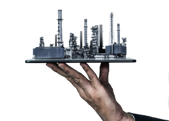 Future factory plant and energy industry concept in creative graphic design. Oil, gas and petrochemical refinery factory with double exposure arts showing next generation of power and energy business.