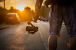 Man holding gimbal with sunset view.