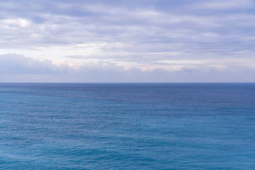  Seascape with sea horizon and almost clear deep blue sky, Background, copy space