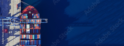 Fotomural Aerial drone ultra wide top down photo of commercial container terminal with cra