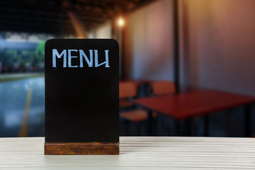 Wall Mural - Blank menu on table against white background