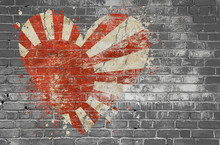 Heart Shaped Flag Of Japan Painted On Brick Wall