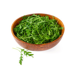 Sticker - Arugula leafs in a wooden bowl