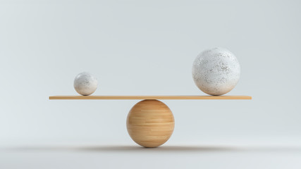 Wall Mural - wooden scale balancing a small and a big ball in front white background
