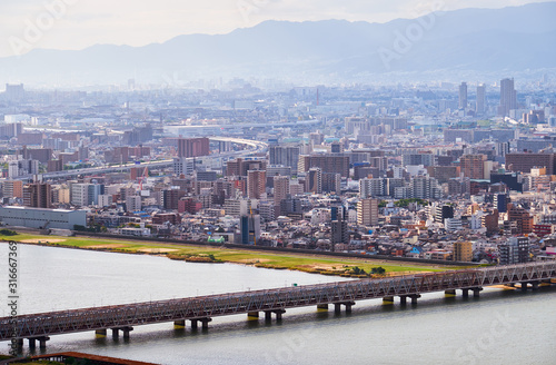 Cuadros en Lienzo The birds eye view of Osaka city with Yodo River. Japan