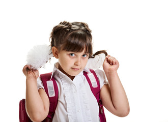 Wall Mural - Portrait of happy schoolgirl with pink backpack showing her festive hairstyle