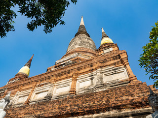 Wall Mural - Thai architecture Ancient times,Most materials are brick and mortar,forming a wall and floor,The surrounding area has a beautiful Buddha statue,On the bright day